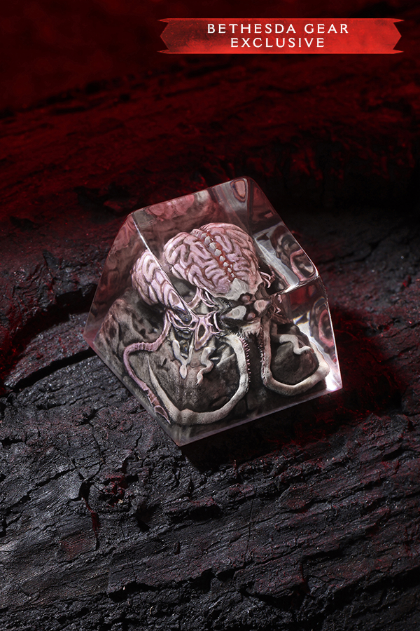 Hexagonal die with skull design on a dark surface, Bethesda Gear Exclusive label at the top.