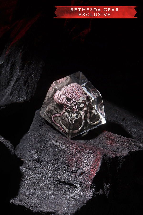 Crystal-like object with engraved design on a dark surface, labeled 'Bethesda Gear Exclusive'.