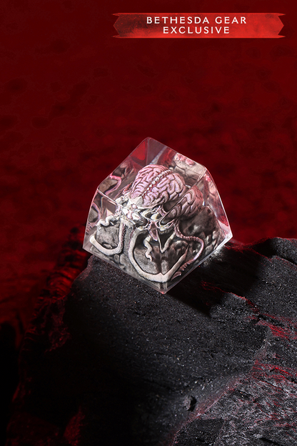Crystal-like object with intricate design on a dark surface against a red background, featuring 'Bethesda Gear Exclusive' text.