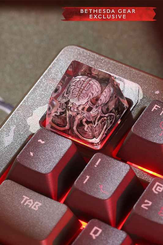 Close-up of a keyboard with a transparent key featuring a brain design, labeled 'Bethesda Gear Exclusive'.