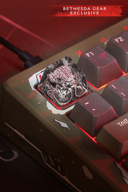 Close-up of a mechanical keyboard with a unique key featuring a brain design, branded as Bethesda Gear Exclusive.