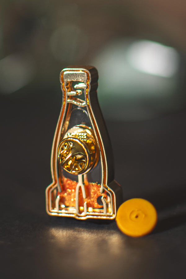 Fallout Nuka Orange Glitter Pin