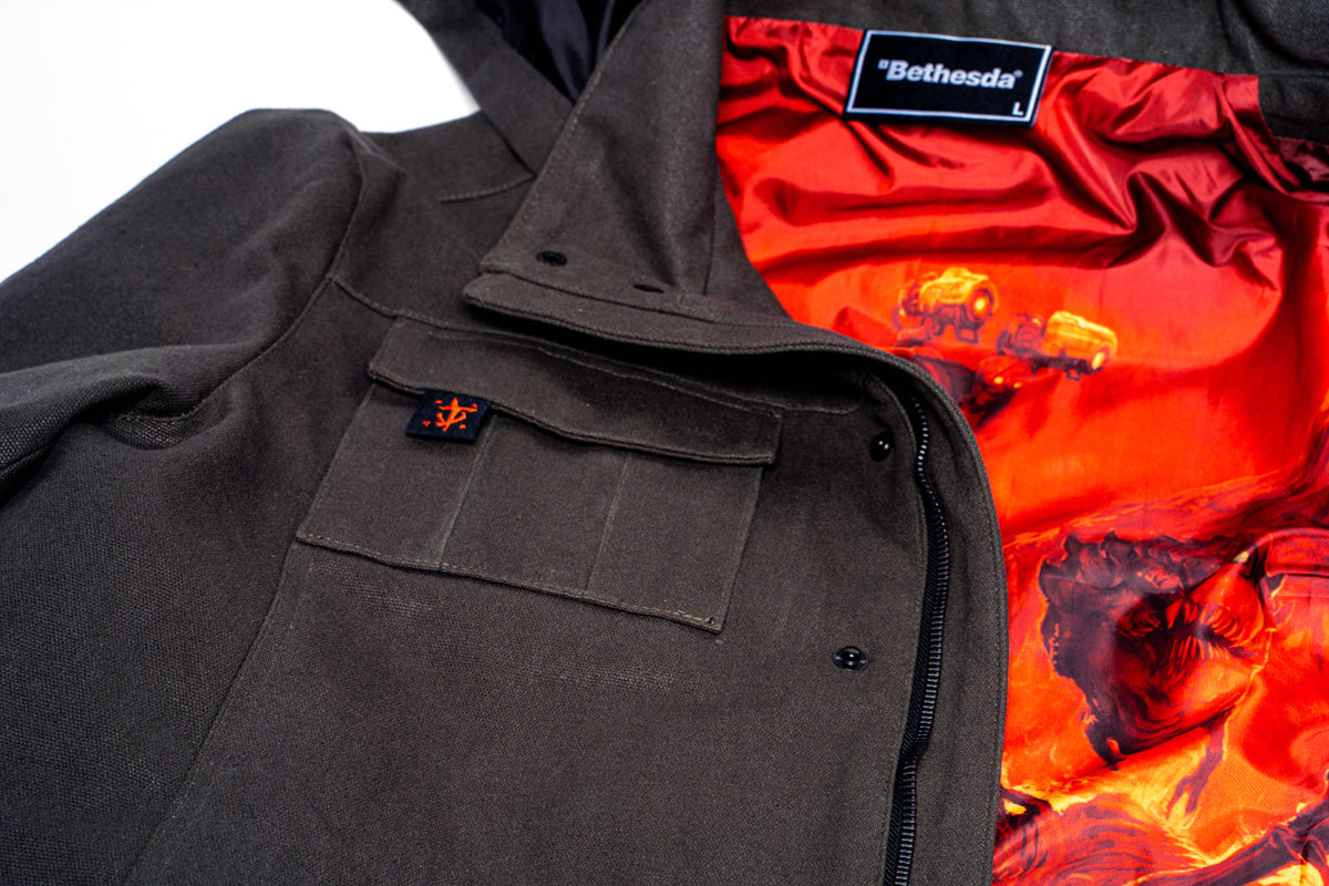Detail view of the Doom Slayer Hooded Jacket internal print and front right pocket