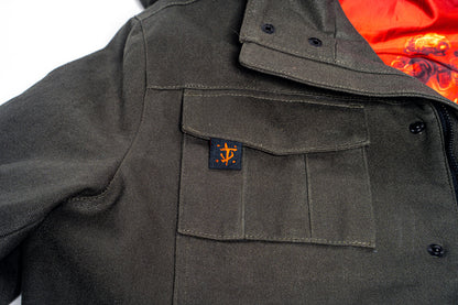 Detail view of the DOOM Slayer Hooded Jacket front right pocket