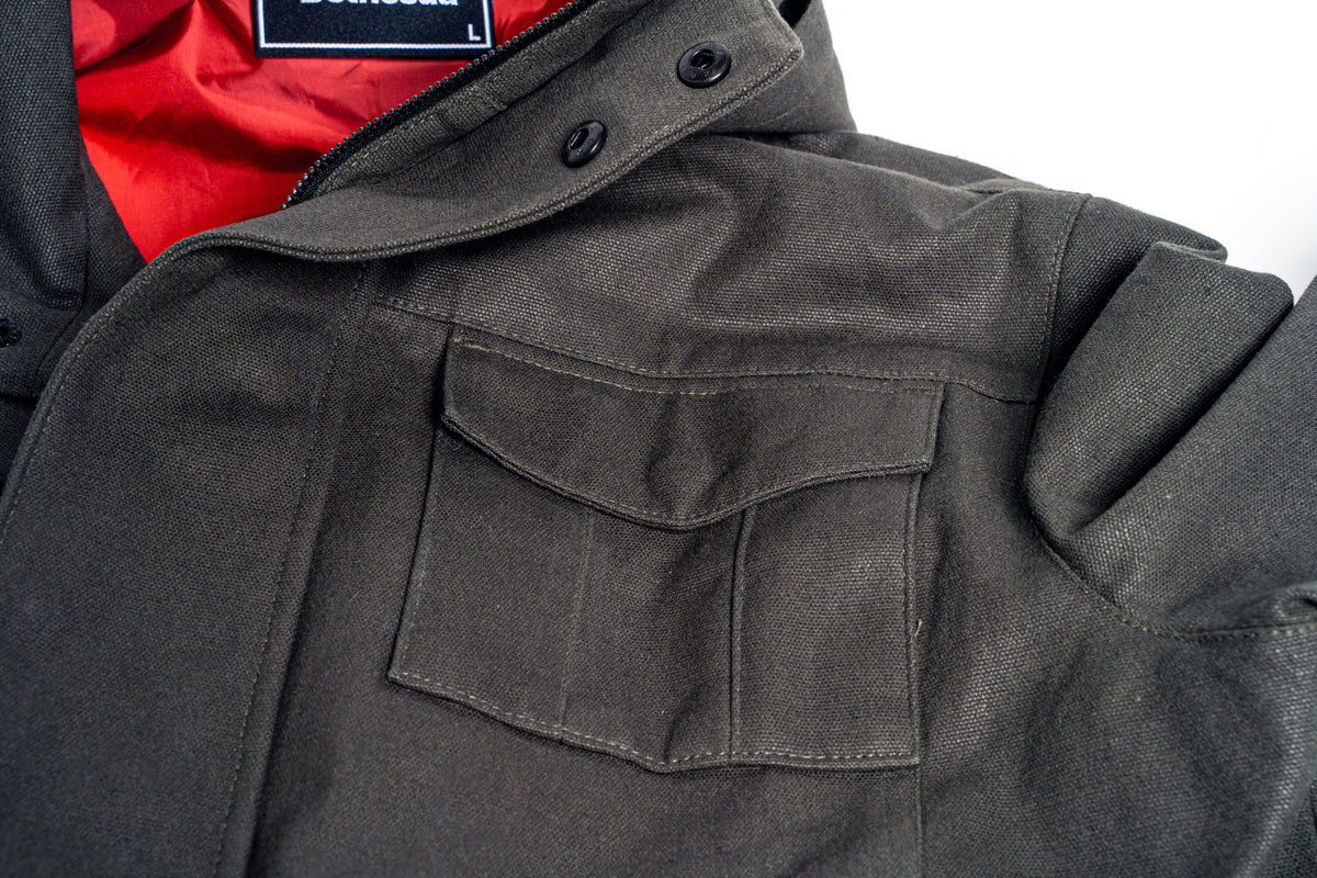 Detail view of the DOOM Slayer Hooded Jacket front left pocket