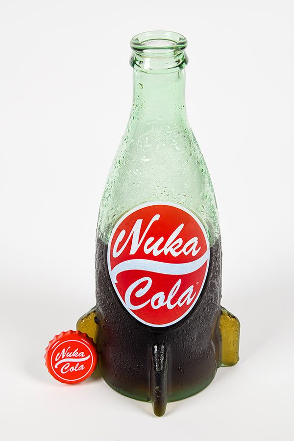 Upper quarter view of the Fallout Nuka Cola Glass Bottle & Cap halfway filled with soda