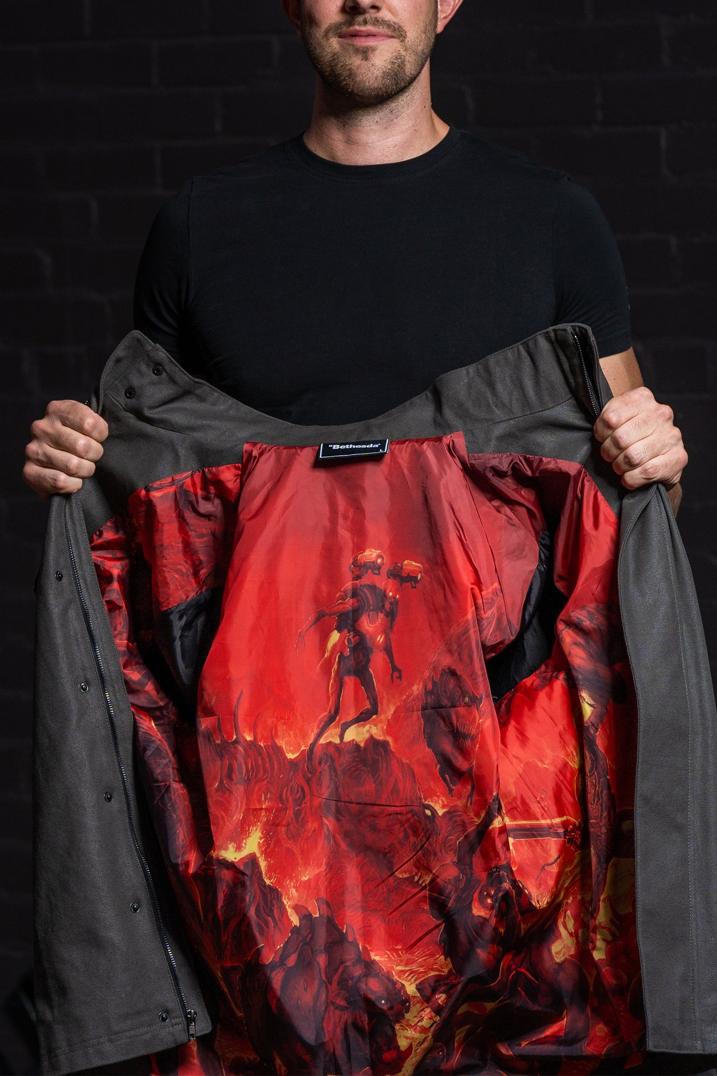 Image of the DOOM Slayer Hooded Jacket unzipped showing the internal print